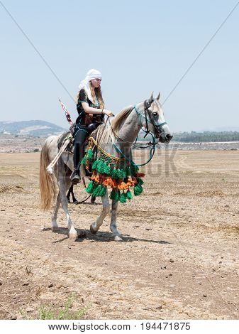 Tiberias Israel July 01 2017 : Participants in the reconstruction of Horns of Hattin battle in 1187 left the camp on horseback and go to the battle site near TIberias Israel