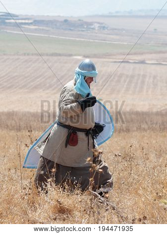 Tiberias Israel July 01 2017 : Participants in the reconstruction of Horns of Hattin battle in 1187 moving around the battlefield near Tiberias Israel