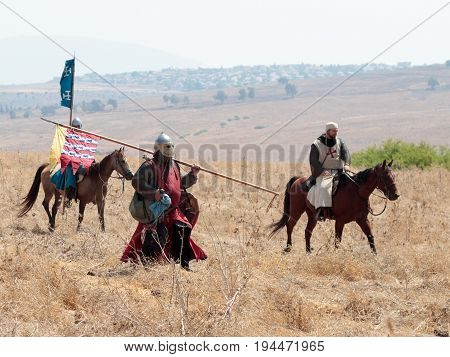 Tiberias Israel July 01 2017 : Participants in the reconstruction of Horns of Hattin battle in 1187 moving around the battlefield near Tiberias Israel