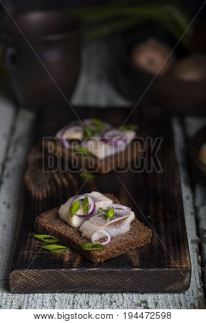 Snack Of Rye Bread, Herring And Onions