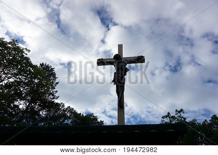 INDIAN RIVER, MICHIGAN / UNITED STATES - JUNE 18, 2017: The Cross in the Woods Roman Catholic National Shrine features the world's largest crucifix.