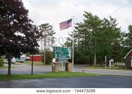 INDIAN RIVER, MICHIGAN / UNITED STATES - JUNE 18, 2017: The entrance to the Cross in the Woods Roman Catholic National Shrine, which features the world's largest crucifix.