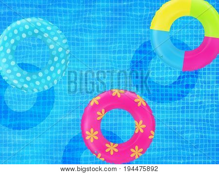 Swim rings on swimming pool water background. Inflatable rubber toy. Realistic summertime illustration. Summer vacation or trip safety item. Top view swimming circles.