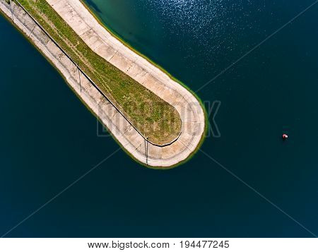 Aerial view breakwater at sea, cutwater, pier, groyne mole