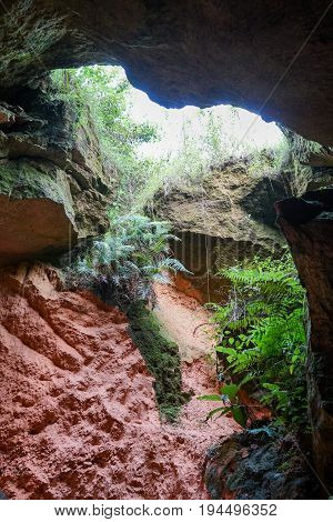 The exploitation of limestone hills canyon forming a unique architectural in Arosbaya Hill Madura Island, Indonesia
