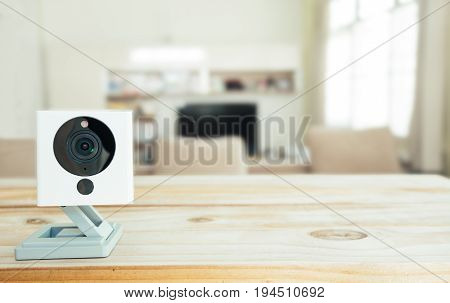 Security camera on Wood table. IP Camera.
