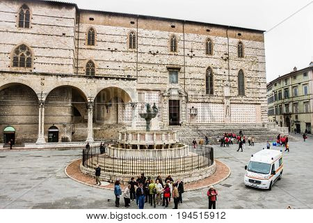 PERUGIA, ITALY. October 26, 2013: Square IV November with fountain and tourists in the city center of Perugia in Italy.