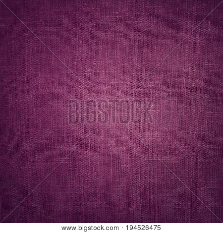 Coarse mauve Canvas Fabric Cloth Burlap Sack texture with darkened edges. Rough grunge background or wallpaper close up. Web banner Square Image