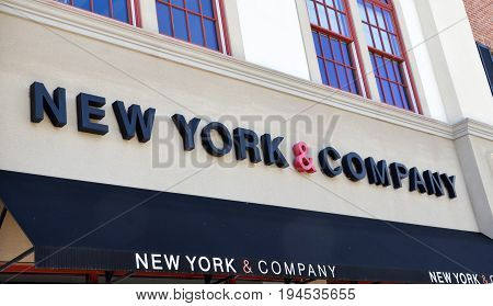 PERRYSBURG OH - JUN 25: The logo of the New York & Company store in Perrysburg OH is shown here on June 25 2017.