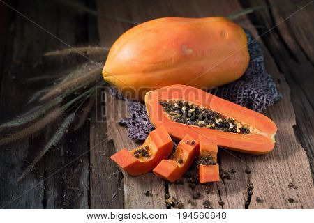 Papaya On Wooden Background. Sliced Of Papaya.