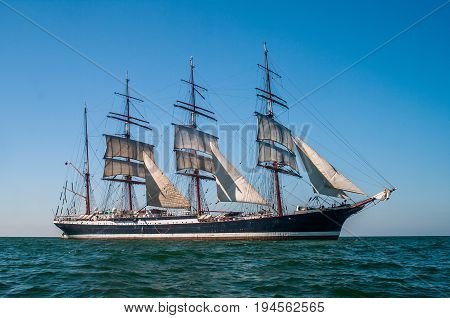 Clear sky, sunny afternoon , Four-masted barque right side view