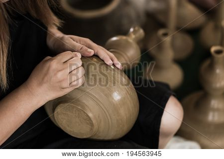 Senior Asian Handcraft Potter Making Clay Pot Earthware By Hand.