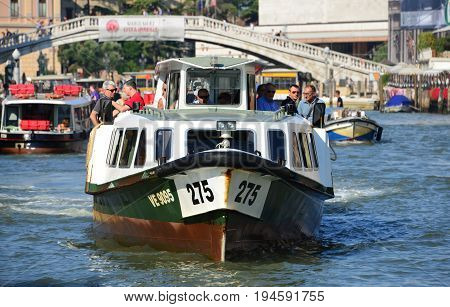 VENICE, ITALY - AUGUST 6: 'Vaporetti' Venice characteristic ferries the city public transport on water AUGUST 6, 2015 in Venice, Italy