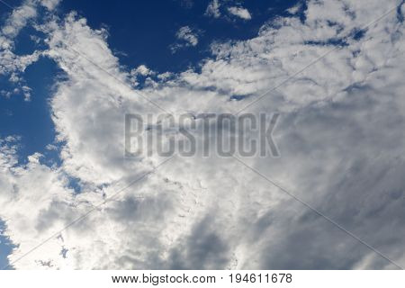 stratocumulus clouds and the dark blue sky