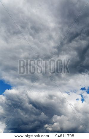 Stratocumulus Clouds And The Dark Blue Sky