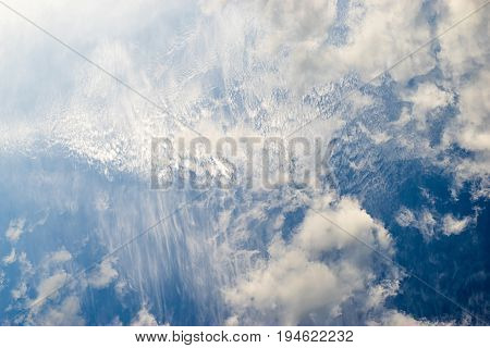 Sky with unusual pattern of spindrift clouds