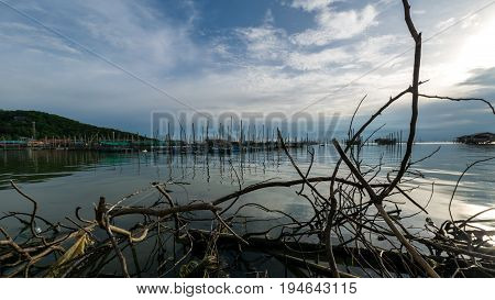 Homestay and floating basket in lake at Kohyo Songkhla Thailand with beautiful sky and clouds. This is traditional fisheries area.