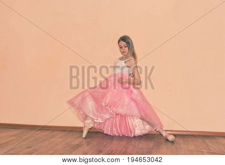 Young Dancer Warming Up At The Gym Doing Dance Moves
