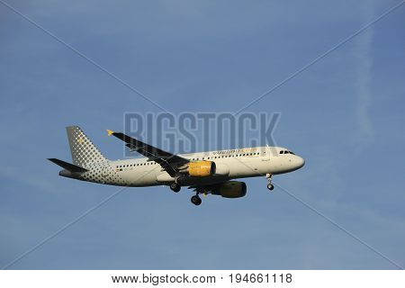 Amsterdam the Netherlands - July 7th 2017:EC-JZI Vueling Airbus A320 approaching Schiphol Amsterdam Airport Polderbaan runway