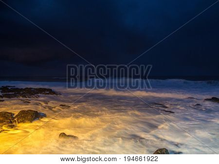 Nightshot of the waves and rocks at the indian ocean at the Wild Coast in South Africa