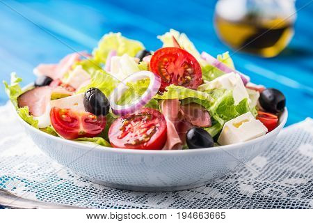 Salad. Fresh Summer Lettuce Salad.healthy Mediterranean Salad Olives Tomatoes Parmesan Cheese And Pr