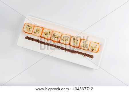 Dessert Maki Sushi - Roll With Various Fruit In Rice Pudding And Coconut Flakes