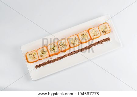 Dessert Maki Sushi - Roll With Various Fruit In Rice Pudding And Coconut Flakes
