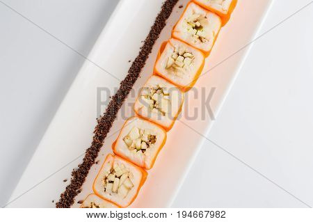 Dessert Maki Sushi - Roll With Various Fruit In Rice Pudding And Coconut Flakes