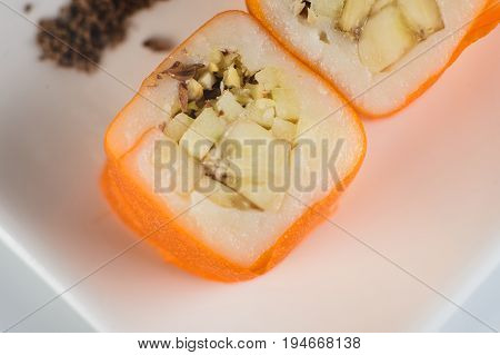 Dessert Maki Sushi - Roll With Various Fruit In Rice Pudding And Coconut Flakes