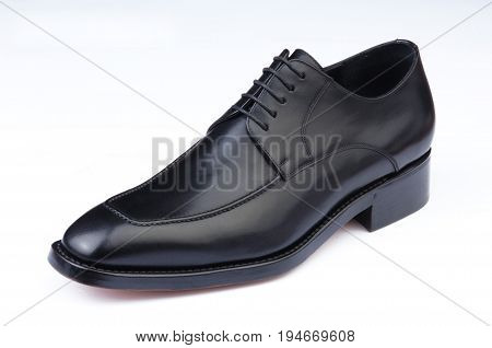 male shoe, black, laced, isolated on white