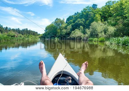 A Man Relaxing On Kayak