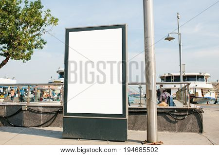 An empty billboard for advertising on the street near the seaport in Istanbul, Turkey. Advertising.