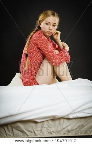Sad Depressed Young Woman In Bed