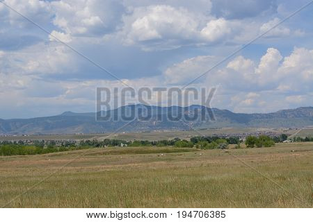 View of Rocky Mountain foothills and Front Range prairie from Standley Lake Regional Park in Westminster Colorado