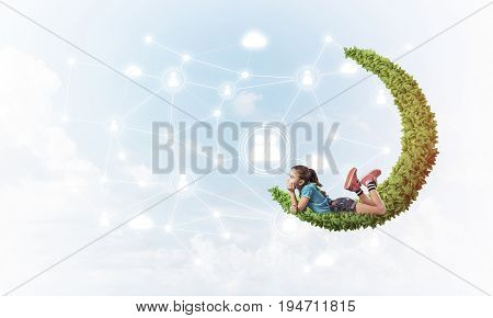 Cute smiling girl on green moon presenting social connection concept