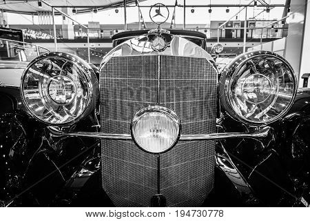 STUTTGART GERMANY- MARCH 17 2016: Fragment of grand touring car Mercedes-Benz 500K (W29) Cabriolet C 1934. Black and white. Europe's greatest classic car exhibition 
