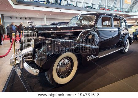STUTTGART GERMANY - MARCH 17 2016: Full-size luxury car Cadillac V16 Series 90 limousine 1939. Europe's greatest classic car exhibition 