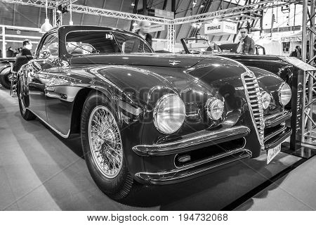 STUTTGART GERMANY - MARCH 17 2016: Vintage car Alfa Romeo 6C 2500 SS Touring Superleggera Coupe 1948. Black and white. Europe's greatest classic car exhibition 
