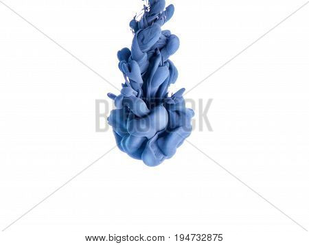 Ink swirl in a water, isolated on white background. The blue paint in the water. Soft dissemination a droplets of colored ink in water close-up. Explosion of color splashes acrylic ink.