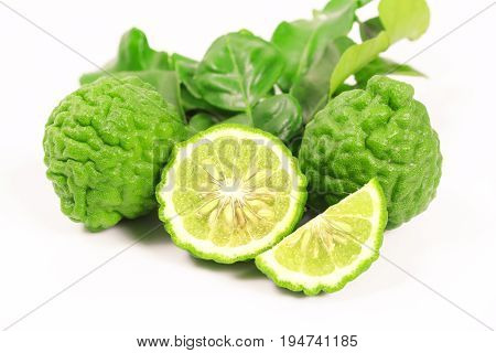 Kaffir lime and kaffir lime leaf on white background