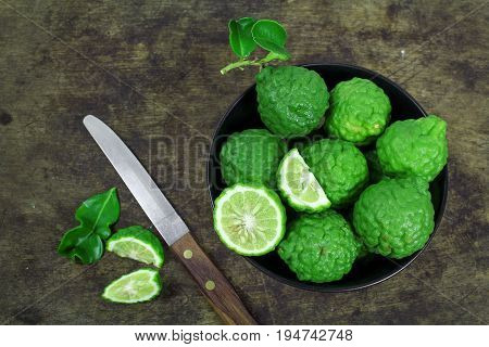 Kaffir lime and kaffir lime leaf on white background
