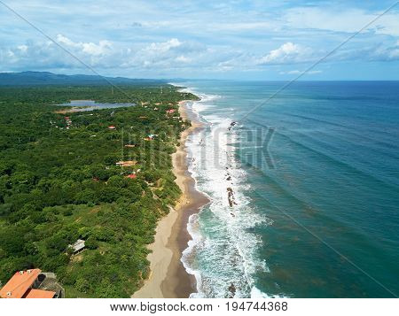 Pacific ocean shoreline aerial drone view. Travel destination in central america