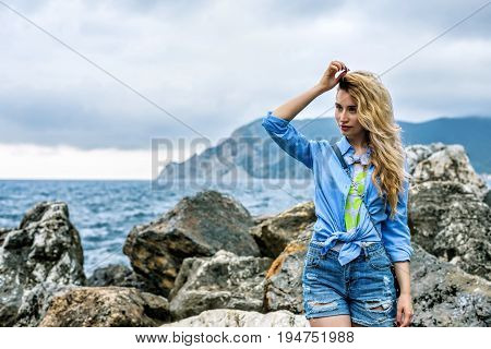 Tourist Girl in Vernazza Cinque terre Italian riviera. Sea and mountain view. Cinqueterre Liguria beauty