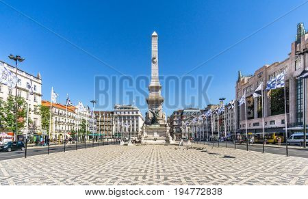 LISBON,PORTUGAL - MAY 17,2017 - Place of Restauradores with Column monument in Lisbon. Lisbon is the capital of Portugal.