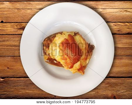 turkish egplant meal karniyarik with cheese on a plate