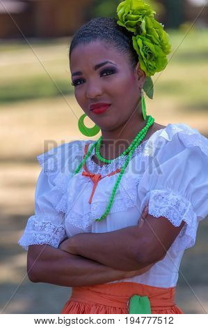 TIMISOARA ROMANIA - JULY 9 2017: Young dancer girl from Puerto Rico in traditional costume present at the international folk festival 