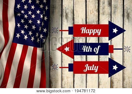 Digitally generated image of rockets with happy 4th of july text  against wood background