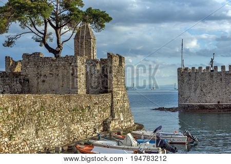 NAFPAKTOS, GREECE - MAY 28, 2015: Sunset panorama of Fortification at the port of Nafpaktos town, Western Greece