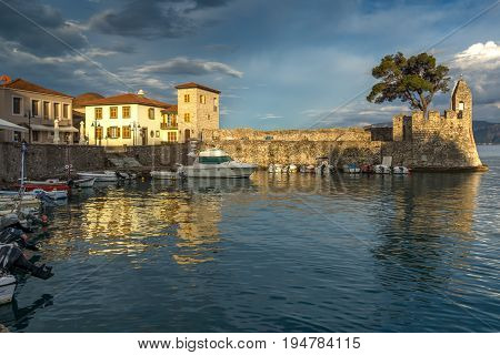 NAFPAKTOS, GREECE - MAY 28, 2015: Sunset panorama of Fortification at the port of Nafpaktos town, Western Greece