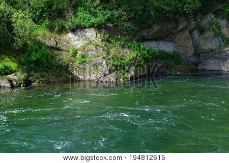 Green water of Chemal river in Altai mountains. Chemal Altai Republic Siberia Russia